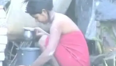 Indian Girl Washing Outdoors