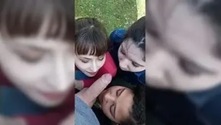 Horny girls share big dick and make triple outdoor blowjob to their good friend
