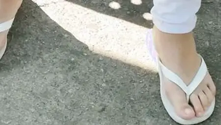 candid teenagers feet - little feet with white flip flops