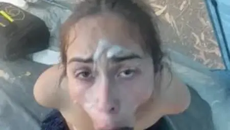 A cute Latin bitch publicly sucks a big black dick right in the tent.