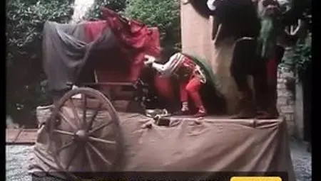 Excellent blonde princess blows king&#039;s cock on the wall in the castle