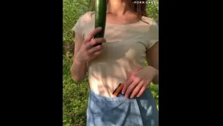 girlfriend fucks cucumber in public park