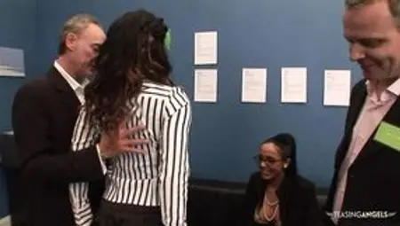 The black secretary is fond of interracial group sex with her bosses at the office