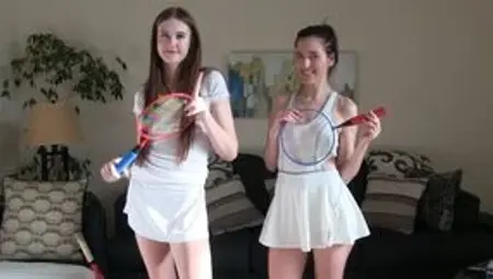 Two sexy girls are playing indoor badminton in a strip game