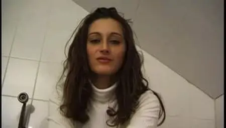 Young chick puts dildo in her butt hole