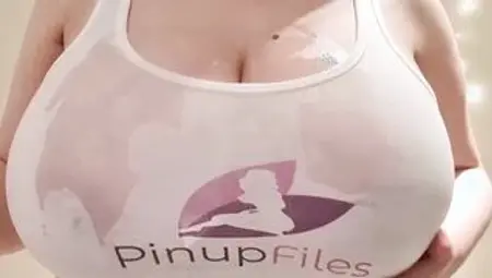 Sara Wiilis wearing a tank top focusing her enormous boobs