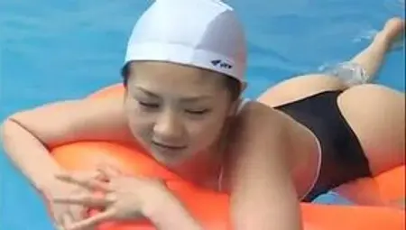 Bathing suit on young Japanese chick Aki Hoshino gets wet