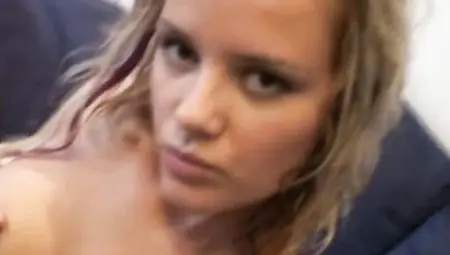 Dazzling blonde lady is smoking a cigar while rubbing her twat