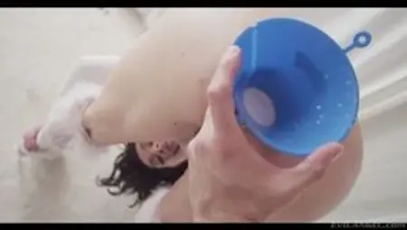 Kinky kitty Lea Lexis is being fed with milk in anal way