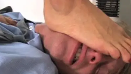 Trampling domina spanks her foot fetish sub in office