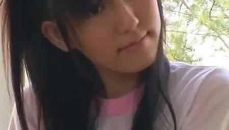 Pretty Japanese babe Honami Mitsui stretches her flexible body and poses on cam wearing sexy bikini
