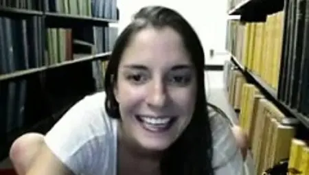 Sexy college babe masturbates in library