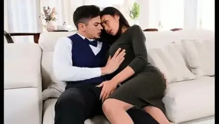 A guy in a tuxedo and a bow tie fucks a mature Asian in tight pussy