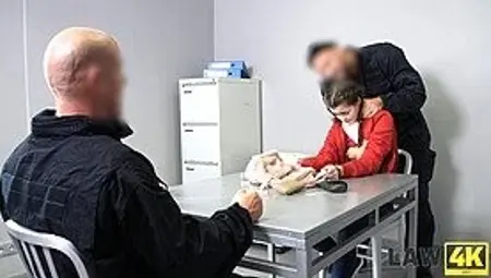 interrogation of a thief by two prison guards