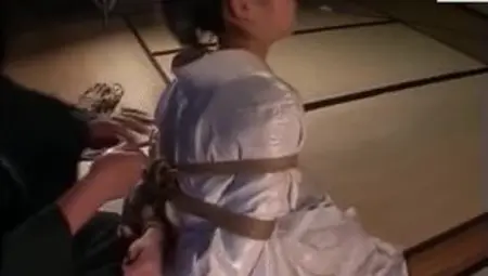 Roped-Up Asian MILF in Bondage Frenzy
