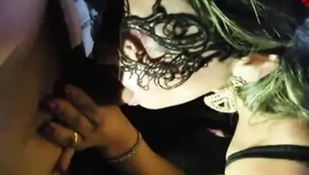 Masked woman, Cristina Almeida is eagerly sucking a sexually excited stranger's rod, to make him cum