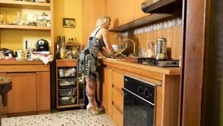 Beauty mommy has sex into the kitchen with stepson