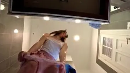 Braless hot brunette skinny and horny babe in a pink mini skirt to show her beautiful ass and legs