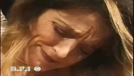 Blonde woman wrapped in foil gets tormented