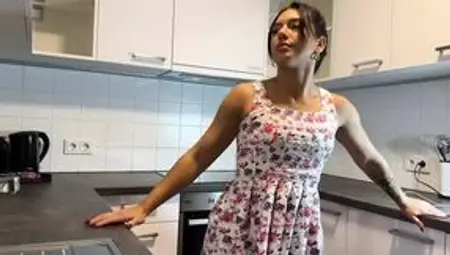 Hot Brunette Bored Wife in a Mini Modified Sun Dress to Flash her Tight Shaved Pussy in the Kitchen
