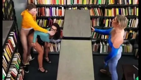 A brunette with glasses gave a cap to a student in the library