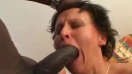 Mature granny takes a big black cock